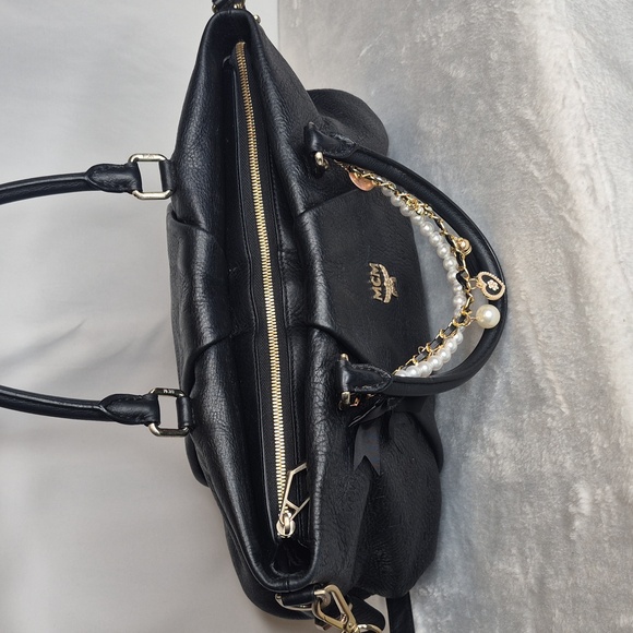 MCM Black Leather Handbag with Gold Accents - Picture 9 of 17
